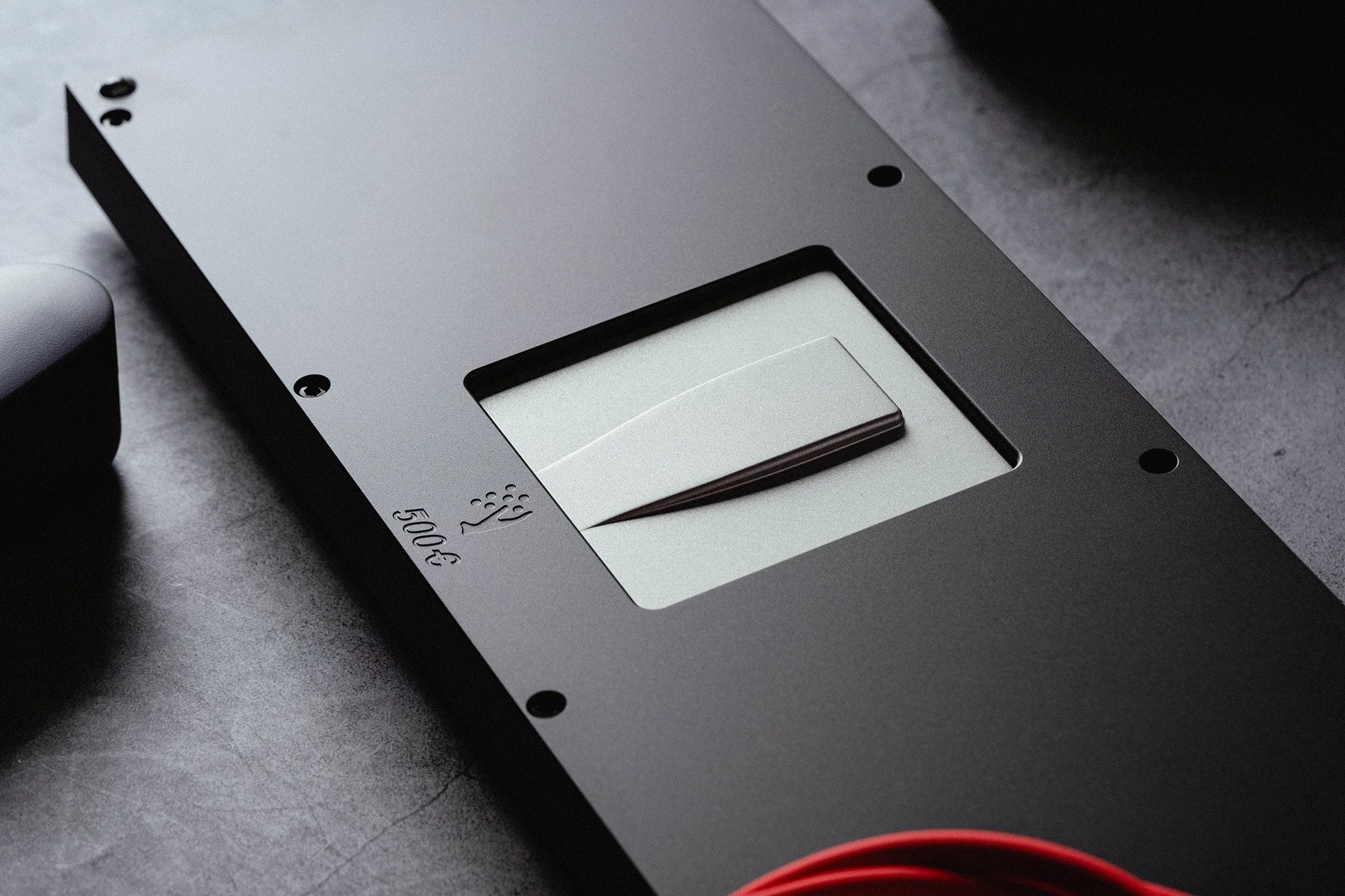 Underside of a machined metal keyboard enclosure